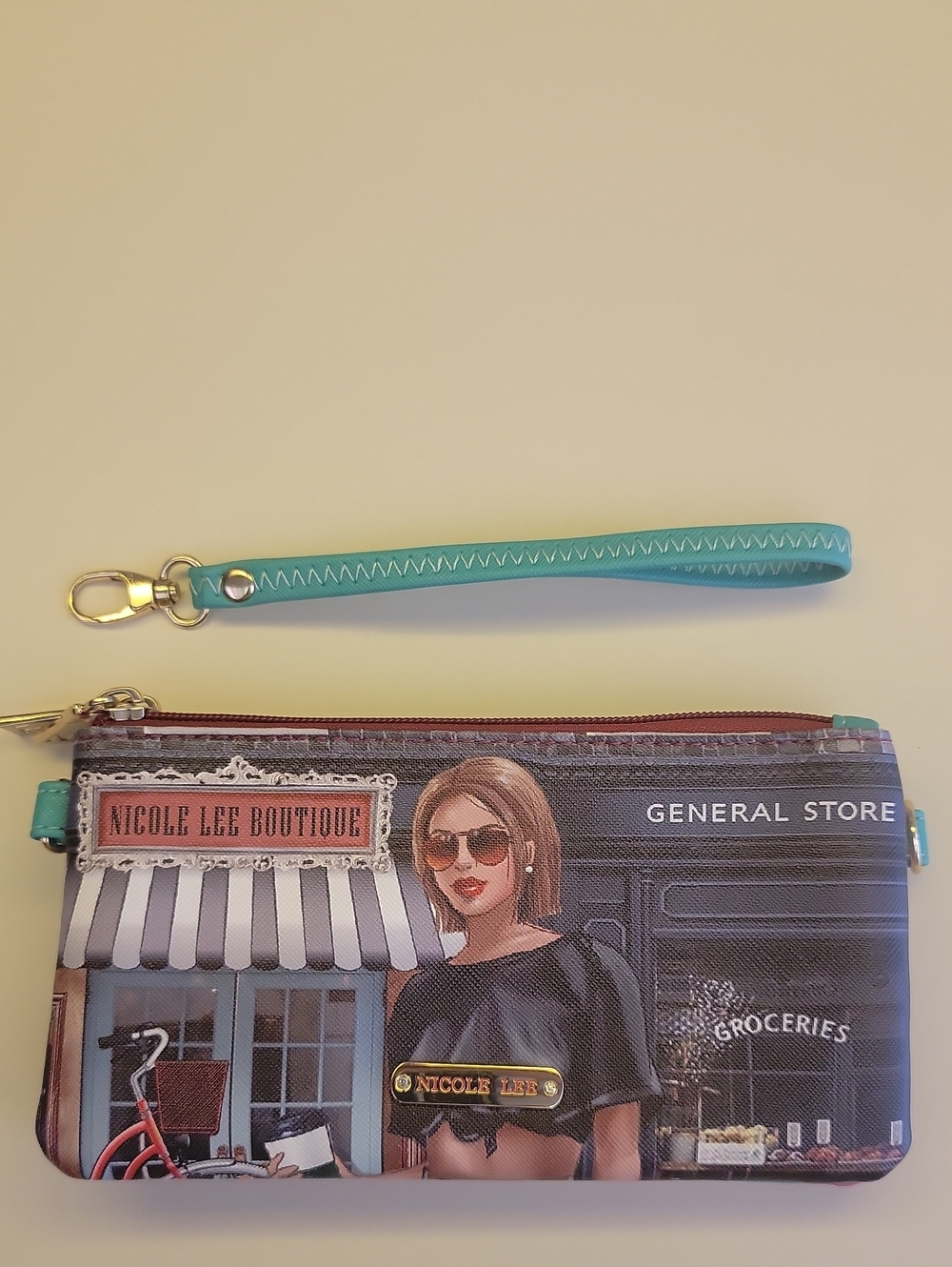 Nicole Lee Turquoise Multi-Panel Printed Wristlet